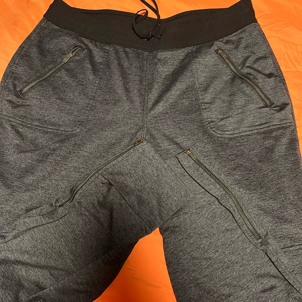 EUC Athleta joggers with ankle side zips. Large